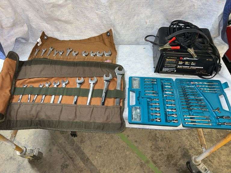 Husky combination SAE wrench set. 5/16" through 7/8" (quantity 10) in Bucket Boss canvas roll. Husky combination wrench set (quantity 11) in Bucket Boss canvas roll, Shop Pro drill driver socket set, Schumacher SE1052 50 amp/10 amp/2 amp, 12 volt DC battery charger image