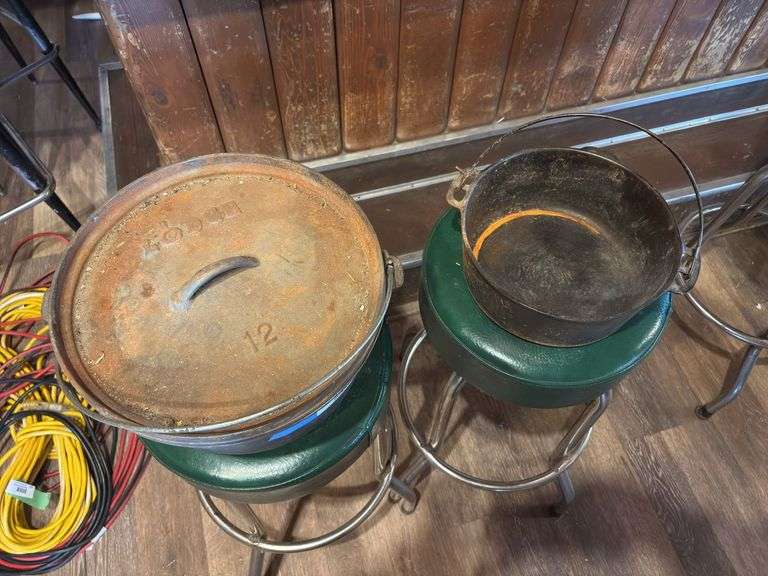 Large number 12 cast-iron dutch oven and Wagner cast-iron Dutch oven - no lid image