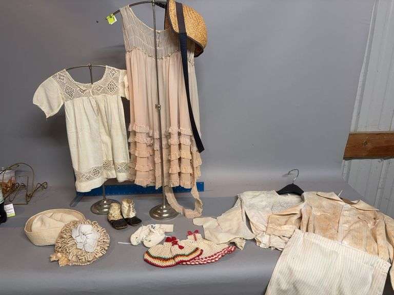 Vintage children’s clothing and hangers image