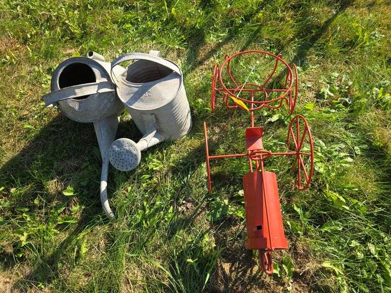 Metal art tractor and trailer planter holder, sprinkling can and radiator can