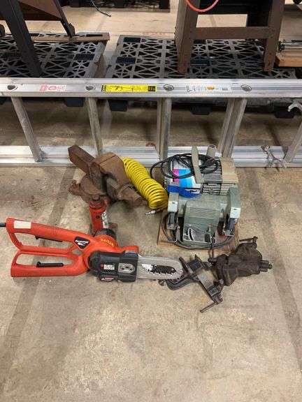 Keller model 3116 type 3 16-ft aluminum extension ladder. Powerpal compressor with hose. Sears 5-in grinder. 4 ton hydraulic jack. 2-in clamp-on vise. Quickcat 3-in clamp-on vise. 3-1/2 in American Seale Company vice - rusty - bench mount. Black& Decker alligator limb trimmer. image
