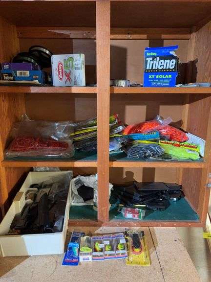 Qty of colored rubber worms, NIB lures, fishing line, filled knife and more image