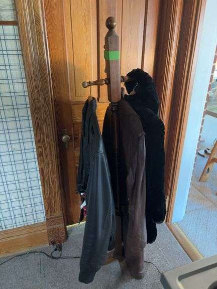 Hall tree includes fur?? coat, 2XLT Jacket Flyers leather jacket and 44T Bermans leather floor length coat image