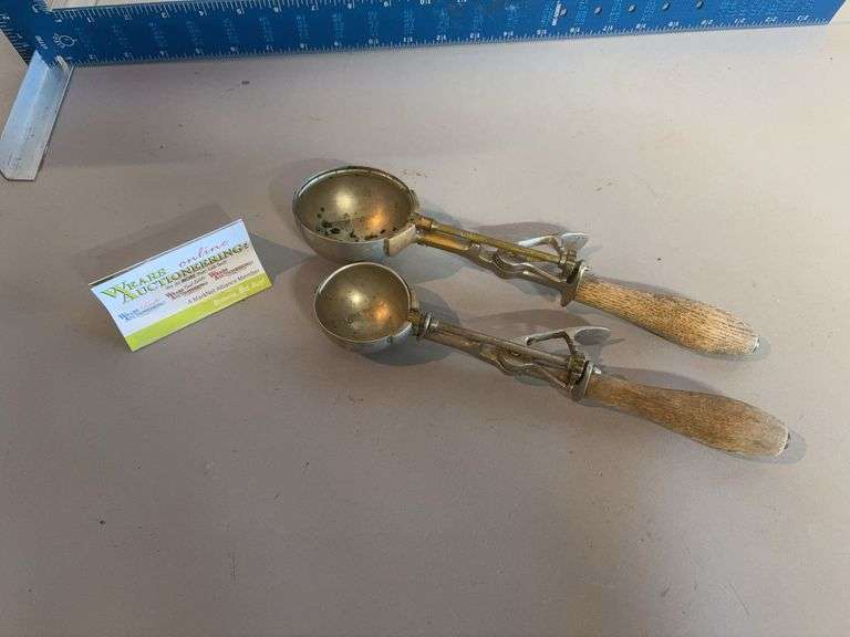Two old Gilcrest ice cream scoops-2” and 3” scoops image