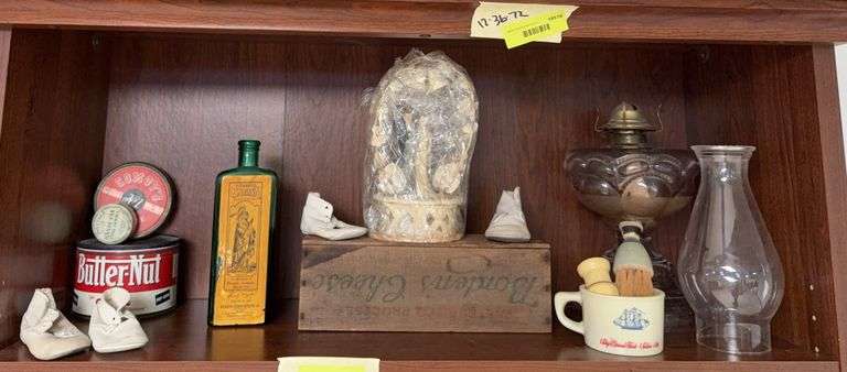 Old wood cheese box, kerosene lamp, bottle and other old items