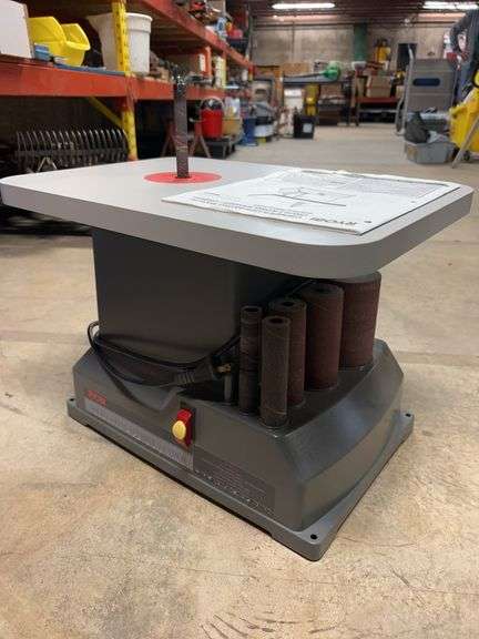 Ryobi oscillating sander with six sleeves for sanding tubes, complete on workmate 200 bench, instruction book. UREVOtreadmill. image