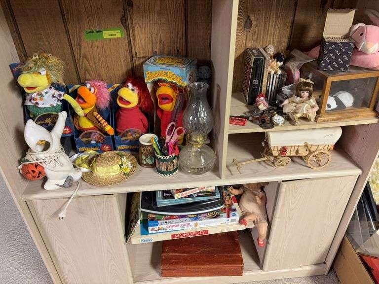 Fraggle Rock characters, oil lamp, chuck wagon, coins, watch fobs, lighters, games, incomplete flatware set and more image