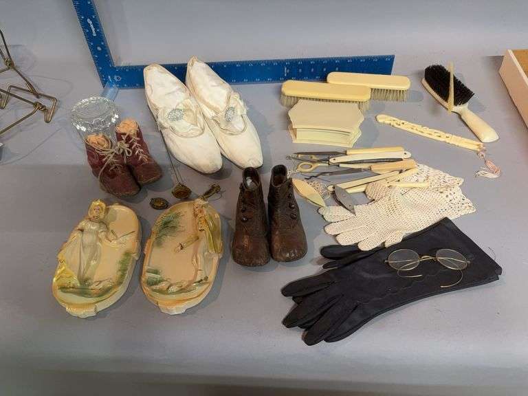 Shoes, gloves, glasses, dresser items, etc image