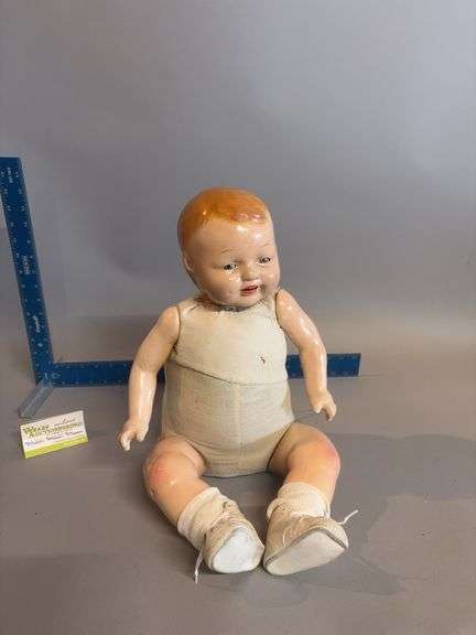 Baby doll w tin head and sleep eyes image