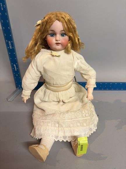Bisque doll w sleep eyes and jointed image