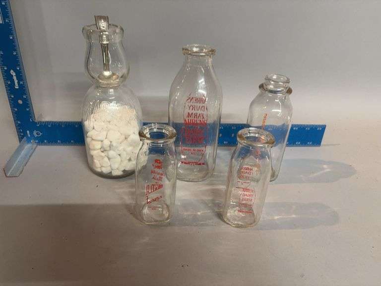 Milk bottles, some local image
