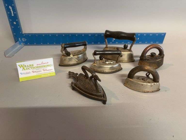 Mini sad irons, rests and handles Check out the swan!! image