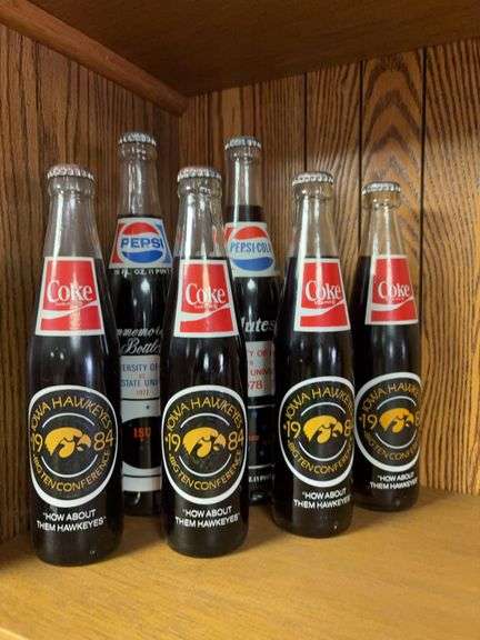 Coke and Pepsi commerative bottles image