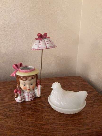 Lady head vase and milk glass hen on nest image