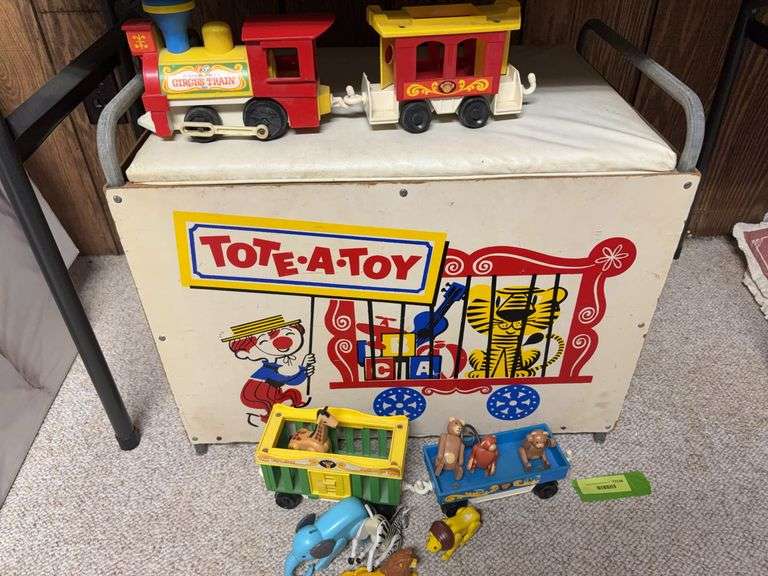 Childs lift top toy box and FP animal train image