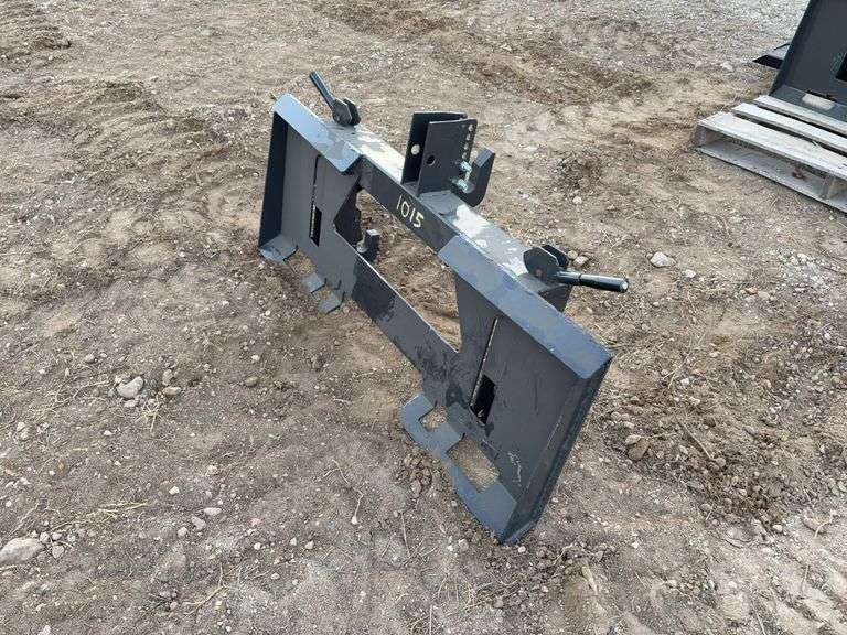 3 Point Quick Tach	WOLVERINE		PT-16-01C	 3 Point Quick Tach Adapt Universal Skid Steer Quick Tach to Category 1 & 2, 3 Point Quick Hitch. - Reinforced with 3.25”x3.25” tubular steel. - Lightweight design saving on your loaders lifting capacity. - Adjustable top hook to fit most attachments. - Spring loaded levers to lock pins into place. - No welding or modifications needed. Attaching is simple and quick, MOUNT VERNON image