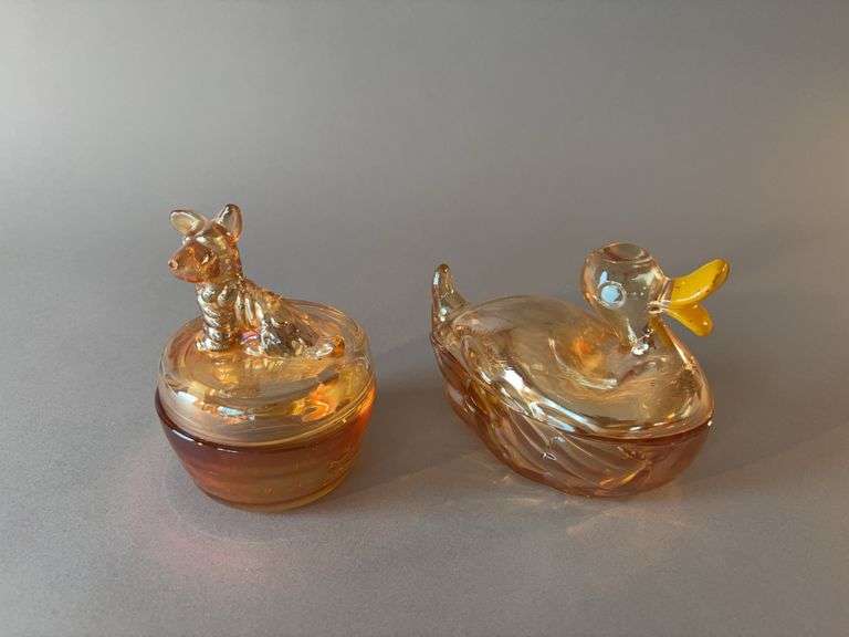 Two marigold carnival glass covered dishes image