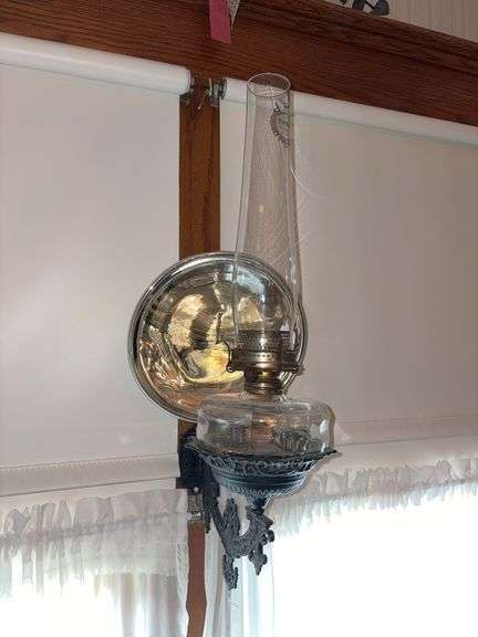 Cast iron wall bracket with oil lamp with Aladdin lock on chimney with Aladdin burner image