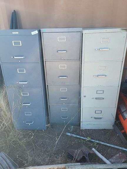 Three file cabinets