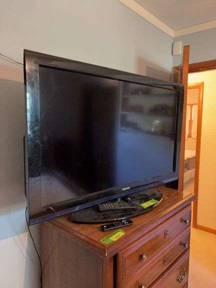 Toshiba 40” flatscreen TV with Amazon Firestick and remotes image