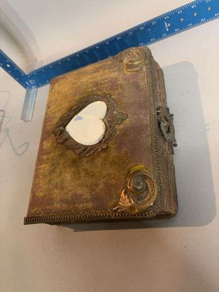 Photo book w paper pages brass accent corners,mirrored heart on cover Pictures too! image