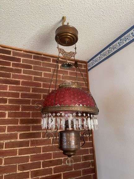 Hanging prism lamp with cranberry hobnail shade, clear glass prisms, brass font, smoke bell, ceiling reel image