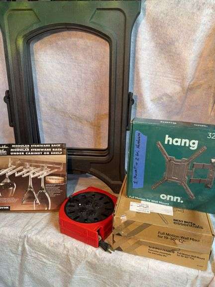 Fold up. Saw horses. Two. Portable fall, 3-speed 21-in wide. Acrylic stemware racks* 2. Nib full motion TV wall mount for 32 to 47-in TV. One mount and additional hardware. Light duty 10 amp extension cord reel. image
