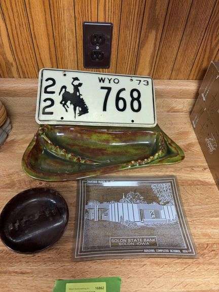 Wyoming license plate and ash trays image
