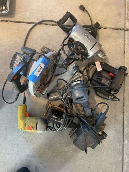 Assorted power tools includes Chicago electric hammer drill, Skil saw, sanders, etc.