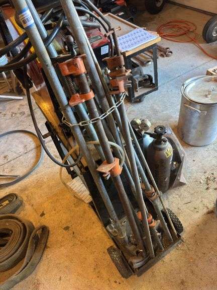 Four pipe clamps and conduit benders