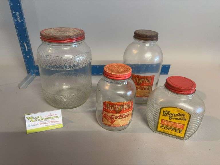Four glass coffee jars-various brands image