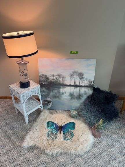Wicker side table, lamp, fuzzy pillows, wall art, faux sheepskin rug 24x63 and more image
