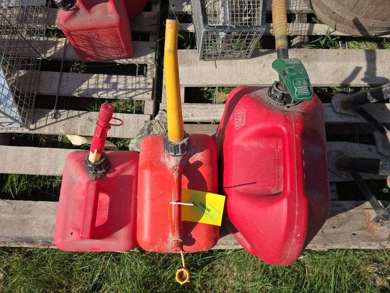 3 plastic gas cans