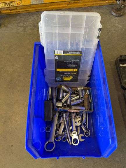 Bin of assorted sockets, end wrenches and swivel boxed wrenches