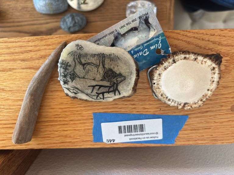 Two antler belt buckles