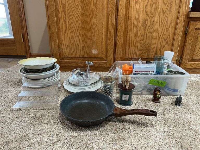 Kitchen items include plates, candle, drinking glasses, sifter, chopper, juicers, etc image