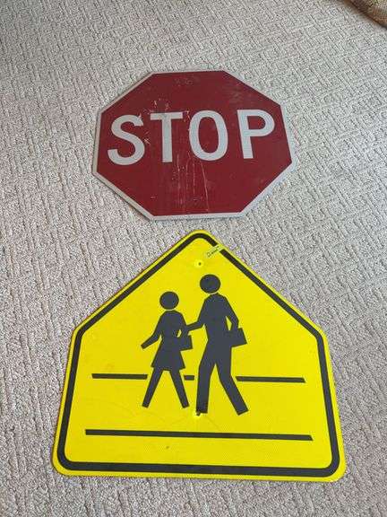 Two road signs “STOP” and “Pedestrian Crossing” image