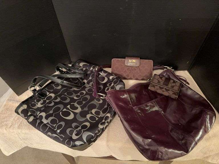 Two Coach purses, two Coach wallets image
