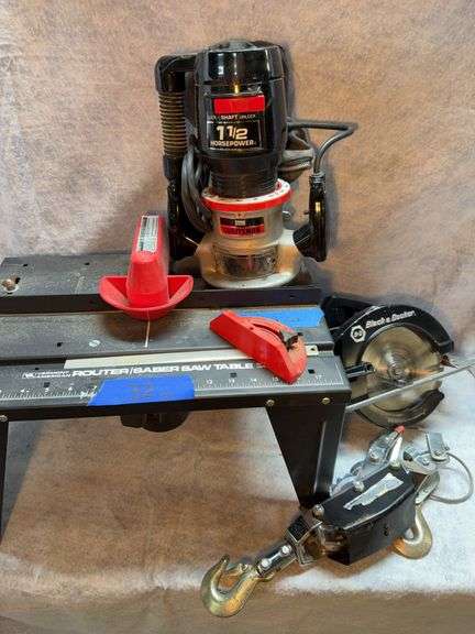 Lot with Vermont American router/saber saw table with Black& Decker router. 19-in wide 12-in deep 11-in high. Craftsman 1-1/2 horsepower router. Come along with 1/4-in cable image