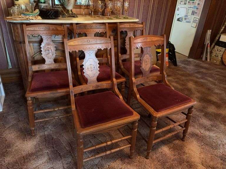 Five chairs with velour padded seats image