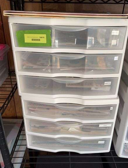 Supply of scrapbooking paper and items in (2) 3 drawer cabinets image