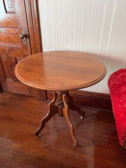 30R walnut parlor table with porcelain casters image