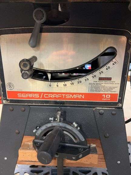 Craftsman 10-in table saw, two extra blades, 80 TPI, no miter gauge. Craftsman shaper or router fence. Craftsman 5-in bench grinder. image