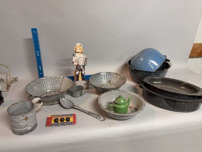 Box full of granite ware and Royal Granite Steel Ware paper advertising image