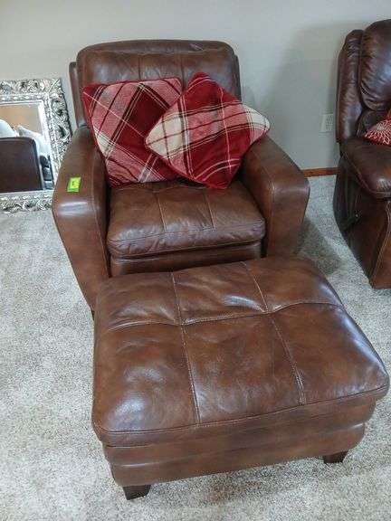 Arm chair with matching ottoman and throw pillows Matches sofa in previous lot image