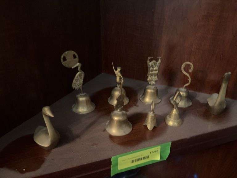 Brass bells and two swans image