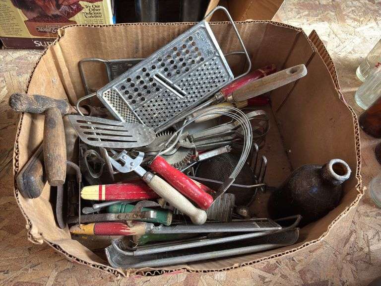Box of antique and vintage kitchen utensils
