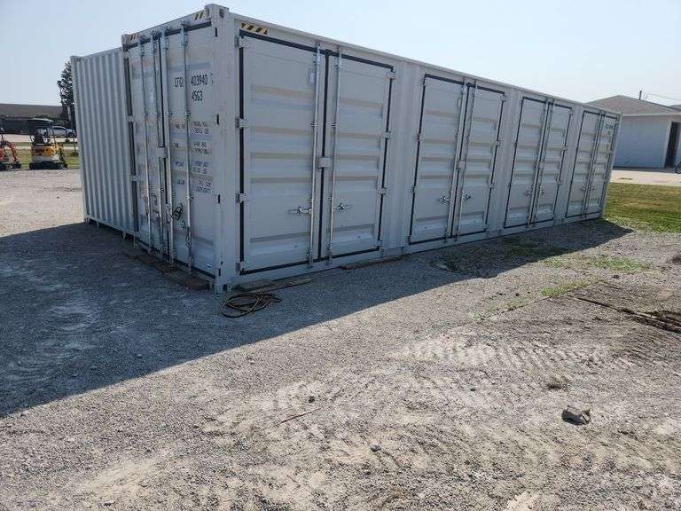 "40' High Cube  Multi-Door Container"	 # LYGU4183406	4-side-door 40' HQ Container	Unused 40FT High Cube Four Multi doors Container. Details: Four Side Open Door, one end door, lock box, side forklift pockets.Measures 8FT Wide, 40FT Long, 113"Tall.  Side Door Opening Measurement: 92" W x 100" T x 88" Deep, Weight 9,500lbs. image