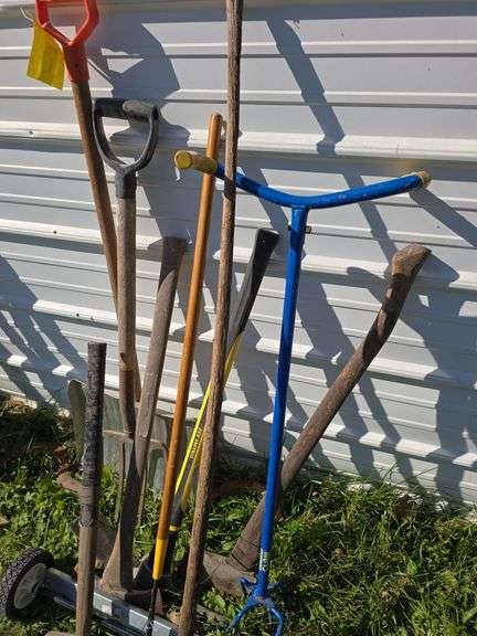 Various long handled yard tools