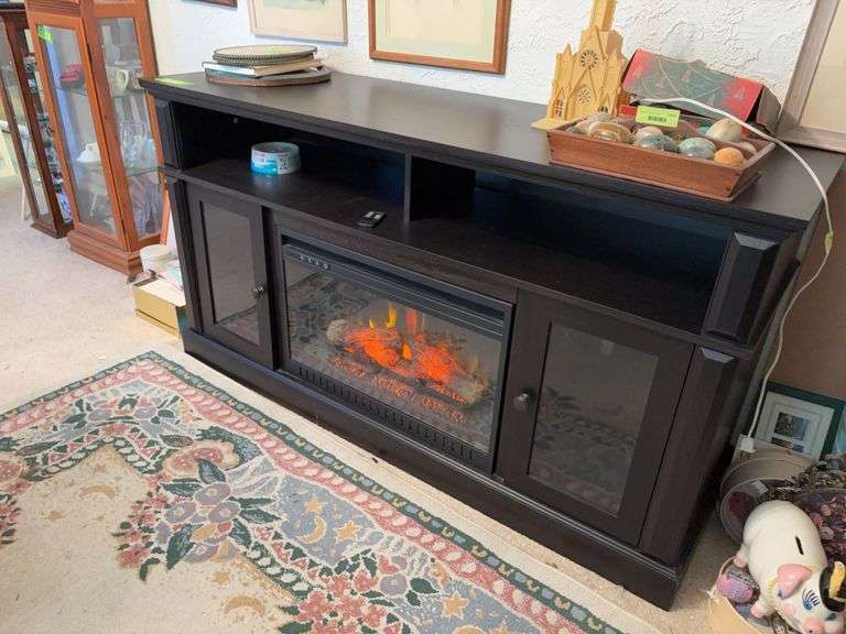 20D x 60L x 32H media center w built in fireplace  Tested and works image